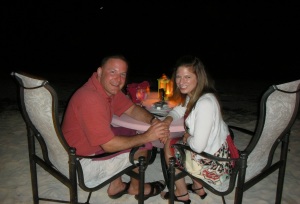 Dr. Robyn and Jason in Aruba at simply fish restaurant on the beach