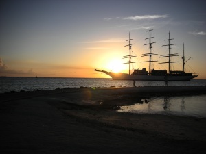 Dr. Robyn takes picture of Aruba Sunset with big boat